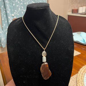 gold chain necklace with rock and bead detailing